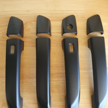 Load image into Gallery viewer, DOOR HANDLE COVERS to suit - 2021-2025 Isuzu D-Max, Isuzu Mu-X &amp; Mazda BT-50  (KEYLESS ENTRY SENSOR HOLES)